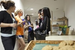 Students enjoying milk and cookies